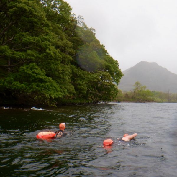 Fully visible swimming in tricky weather in Crummock Water